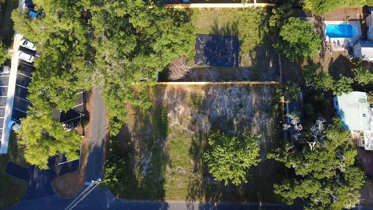 Welcome to 906 NW 10th Street—an extraordinary opportunity in Gainesville’s historic Spring Park neighborhood. This property consists of TWO lots that can be purchased together or separately. (This listing is for both lots together.) Just minutes from the University of Florida and the vibrant downtown district, this expansive 0.48-acre parcel is cleared, primed, and ready for your vision. Whether you're a luxury homebuyer looking to design your dream residence, an investor seeking income-producing potential, or a developer ready to build in one of Gainesville’s most walkable, character-filled neighborhoods, this property checks all the boxes. Comprised of two platted lots (each 75' x 140'), the property is available for purchase together or individually—offering flexibility for a wide range of projects. Zoned RSF, each lot allows for a primary residence as well as both an attached and detached accessory dwelling unit (ADU), subject to city approval. From private guest homes and short-term rentals to multigenerational living, the options are as open as the land itself. Utilities including public water, sewer, and electricity are available, and there's an irrigation well at the northwest corner of Lot 26.