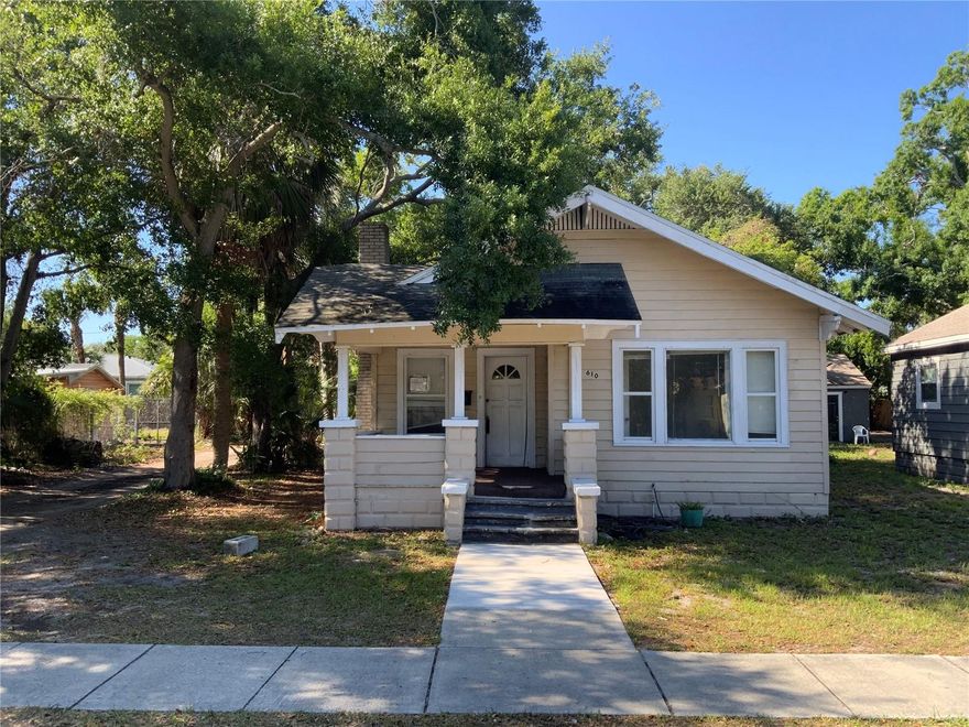 Unleash the potential of this absolutely fabulous fixer-upper in highly sought-after South St. Pete! Bursting with opportunity and charm, this property is a dream canvas for investors, visionaries, or anyone ready to create something truly special.  Enjoy the rare advantage of side alley access—ideal for adding an income-producing ADU or expanding your vision even further. High and dry in Flood Zone X!  Inside, you’ll find original hardwood floors throughout, ready to be restored to their timeless beauty, along with a bright and spacious living room and kitchen filled with natural light.  Key updates like a brand-new electrical panel and hot water tank give you a valuable head start, while the classic 2-bedroom, 1-bath layout offers the perfect foundation to reimagine, renovate, or completely transform.  Whether you choose to revitalize this hidden gem, build your dream home, or maximize the lot’s potential with new construction, this property offers endless possibilities in a rapidly growing area. Opportunities like this don’t come around often—bring your vision and make it extraordinary!