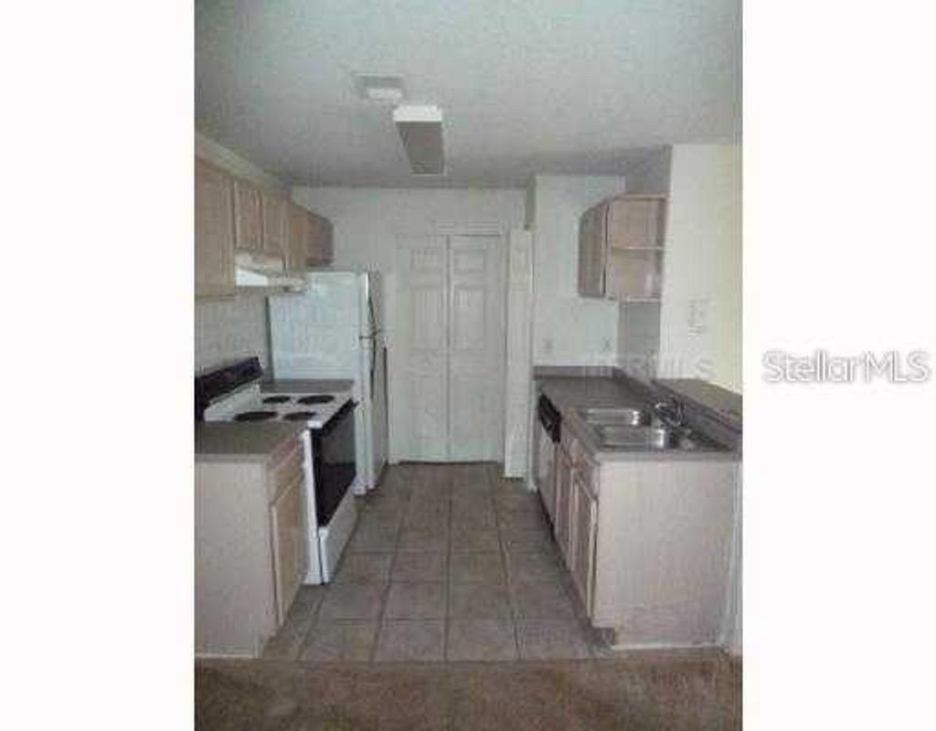 Photo of 8915 Latrec Avenue #203, Orlando, FL 32819 (MLS # S5142044)