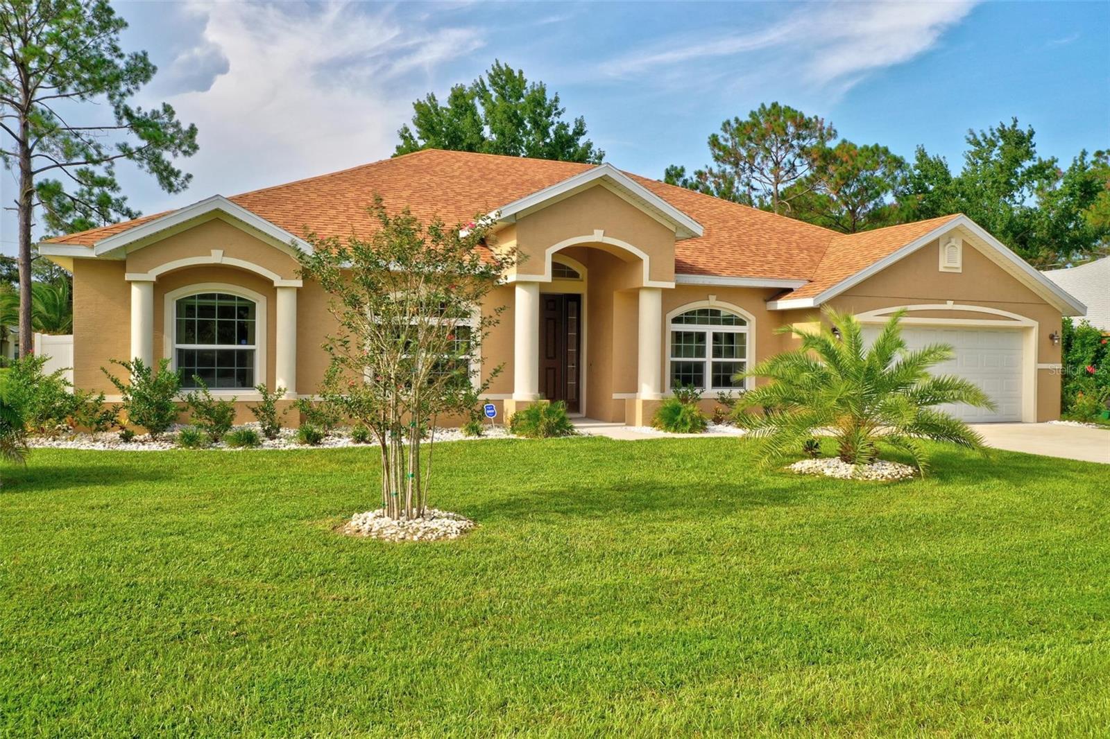 Very well located in the heart of Palm Coast, a FULLY furnished ravishing POOL house! The house is situated on a large, completely fenced-in corner lot. Over 2650 sq. ft living space includes separate living, dining, family room, open kitchen, breakfast nook, and 4 bedrooms/3 full baths including 2 king-sized master suites. All areas are spacious, bright, and well-sized, with high ceilings throughout. This impeccable kitchen with granite counters is equipped with all utensils and dishes. In-house laundry offers excellent condition washer/dryer. You can start each day with a cup of coffee on the peaceful, completely private rear patio with a spectacular pool. The minimum rent term is 183 days. The best way to buy a house stress-free is to rent it for a while and search for your dream home in Palm Coast or elsewhere in Florida. Take advantage of this flexible-term lease offer to see how you fit in with Sunshine State Paradise.