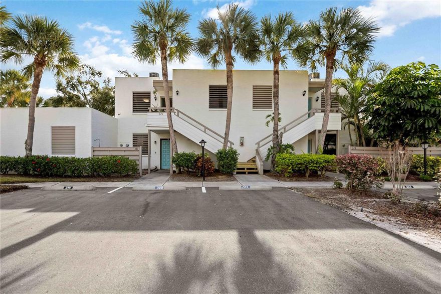 Beautifully remodeled modern condo flooded with natural light and overlooking serene, private views of lush tropical landscaping—perfect for inspiring your green thumb. The 2022 remodeled kitchen features sleek white modern cabinetry, a coffee bar, owner also added additional cabinetry for storage, and then selected top-of-the-line Samsung smart appliances. A new water heater was installed in 2022. Luxury vinyl wide-plank flooring flows through the bedroom spaces along with a neutral tile in the main living, kitchen and baths. Don't miss the full size (2022) LG washer and dryer conveniently built into the kitchen. The entire unit was also repainted in 2022 in serene colors. 

Both bathrooms offer tile flooring, with a new vanity and tub/shower combination in the primary and a walk-in shower in the private guest en-suite. The primary suite is enhanced by a custom walk-in closet in addition to the standard closet. 
Owner recently added cellular shades to the rear sun porch for additional privacy and they also help with insulation.
Peaceful green views, modern upgrades, and refined finishes create an effortless, upscale Florida lifestyle.
7 Miles from Anna Maria Island, 5 Miles to the Sarasota / Bradenton Airport, and less then 1 mile to IMG academy. Surrounded by shopping and restaurants. 
 
Included in the HOA fee's are trash, water, cable, internet, exterior maintenance and grounds, pool, pickle ball and tennis courts. 
The Wildewood Springs Condominiums, modernist in design, are arranged in an 88-acre Audubon bird and wildlife sanctuary, an old Florida oasis of palm trees, live oaks, flowering trees, and lakes. Residents enjoy biking and walking through the lush, tropical grounds.
Some furnishings available for sale.