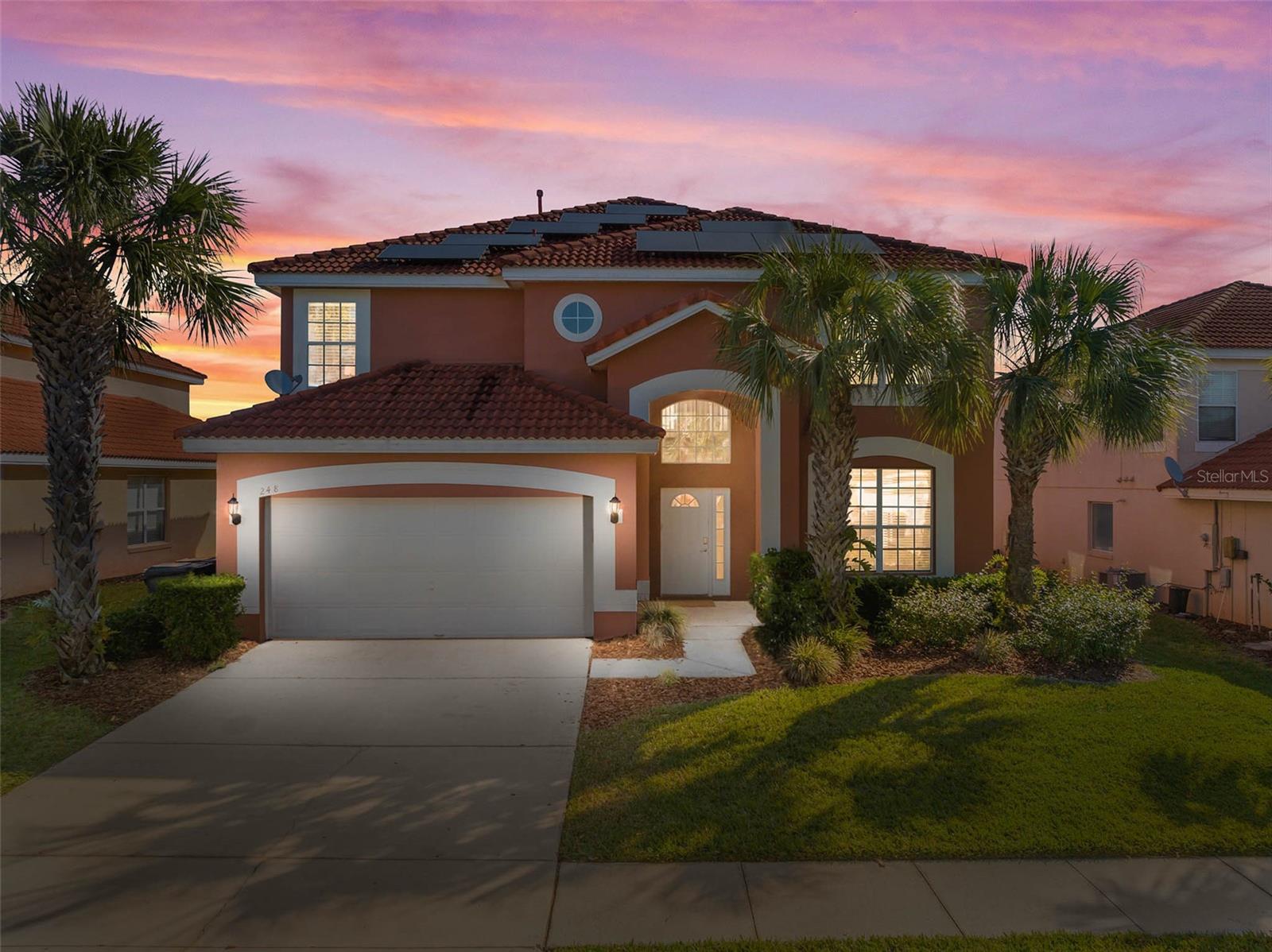 Experience the epitome of Central Florida living in this stunning 7-bedroom, 4.5-bathroom home located within the prestigious Solana community, a gated neighborhood offering 24/7 security for peace of mind and a sense of exclusivity. Nestled near shopping, Walt Disney World, Reunion, and Champions Gate, with easy access to major highways, this home is ideally situated for enjoying everything Central Florida has to offer. Thoughtfully designed with 7 generously sized bedrooms, including two master suites—one conveniently located on the main floor and another upstairs—this home offers plenty of space for everyone. Freshly painted and professionally cleaned, it’s move-in ready, featuring low-maintenance laminate flooring and tile throughout—no carpet! The bright and inviting open-concept family room is bathed in natural light, thanks to numerous windows and soaring ceilings, creating a welcoming space for relaxation and entertaining. The well-appointed kitchen includes a cozy dinette area, a central island, and a picturesque view of the patio and pool deck. Step outside to your private backyard oasis, complete with a heated pool and hot tub—perfect for unwinding after a day at the theme parks or hosting gatherings with family and friends. Plus, this property is fully furnished and turnkey—no need to move your old furniture back home. We’ve provided top-of-the-line furniture, bedding, towels, and even smart TVs in every room! To top it all off this house is also equipped with solar panels, keeping your power bill to a minimum. As a resident of Solana, you’ll enjoy access to an array of resort-style amenities, including a clubhouse, fitness center, arcade game room, mini-golf course, and a resort-style pool and hot tub, with a Tiki bar for a refreshing drink. Enjoy the convenience of having pool maintenance, cable, internet, groundskeeping, and garden trimming all included, ensuring hassle-free living.