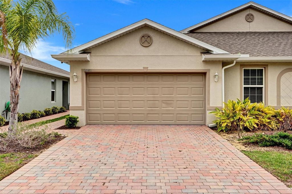 Photo of 20462 Plumwood Loop, North Fort Myers, FL 33917 (MLS # C7524751)