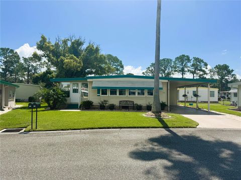 Photo of 136 Dogwood Trail, Leesburg, FL 34748 (MLS # R4909786)