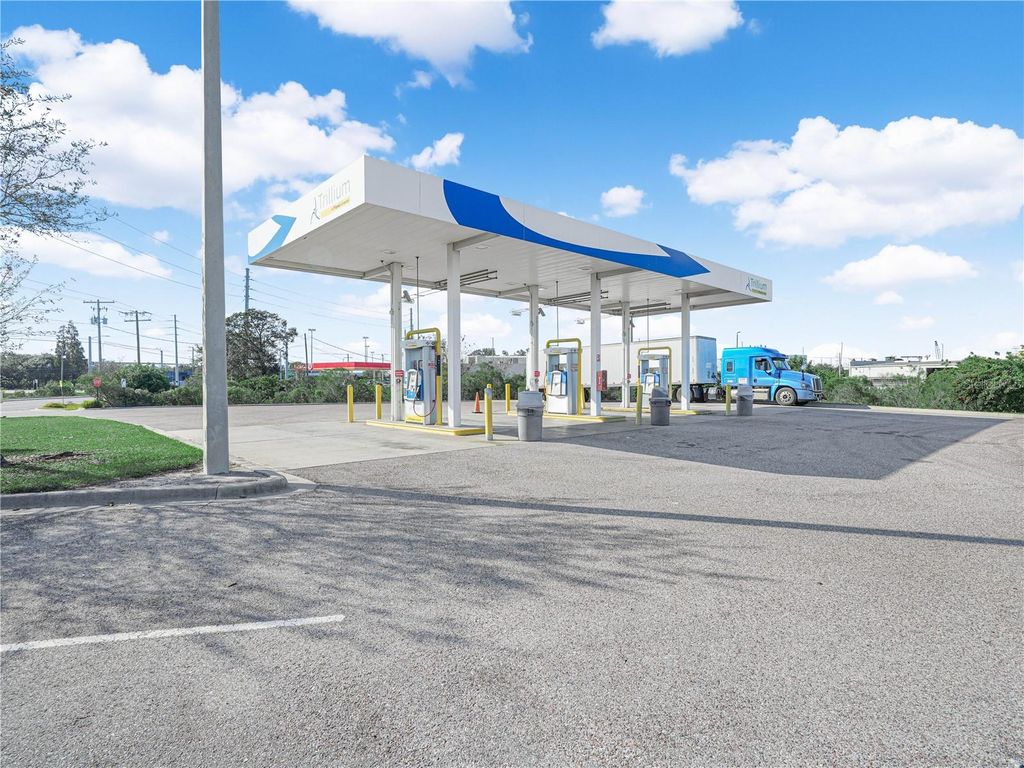 Photo of 5030 Madison Avenue, Tampa, FL 33619 (MLS # P4937477)