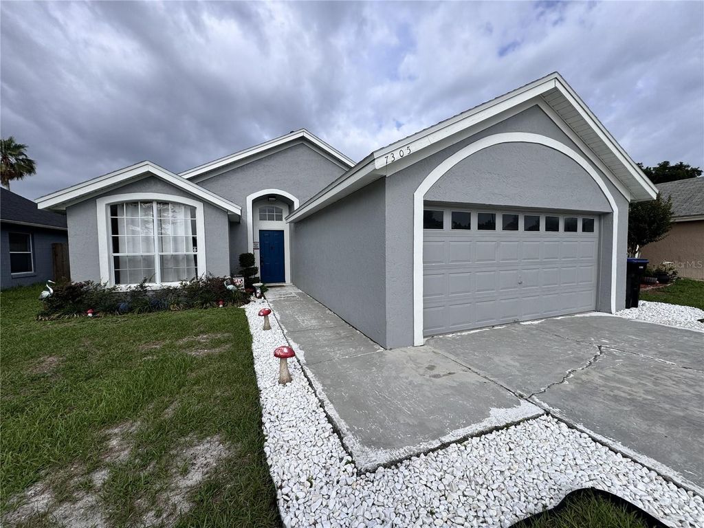 Photo of 7305 Marseille Circle, Orlando, FL 32822 (MLS # O6410031)