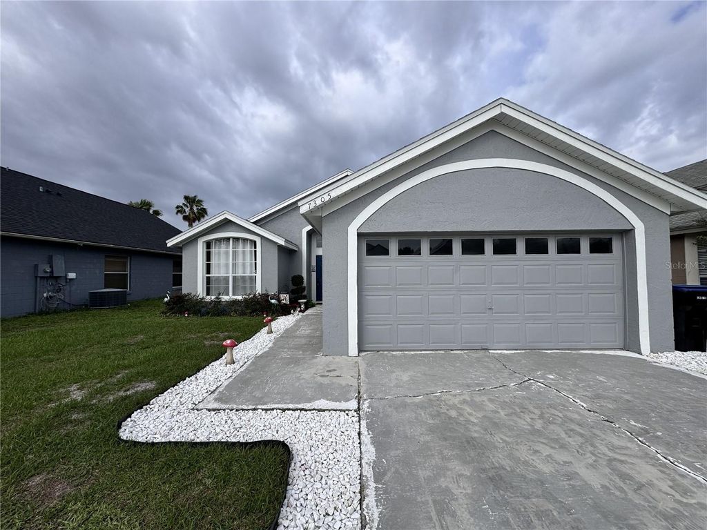 Photo of 7305 Marseille Circle, Orlando, FL 32822 (MLS # O6410031)