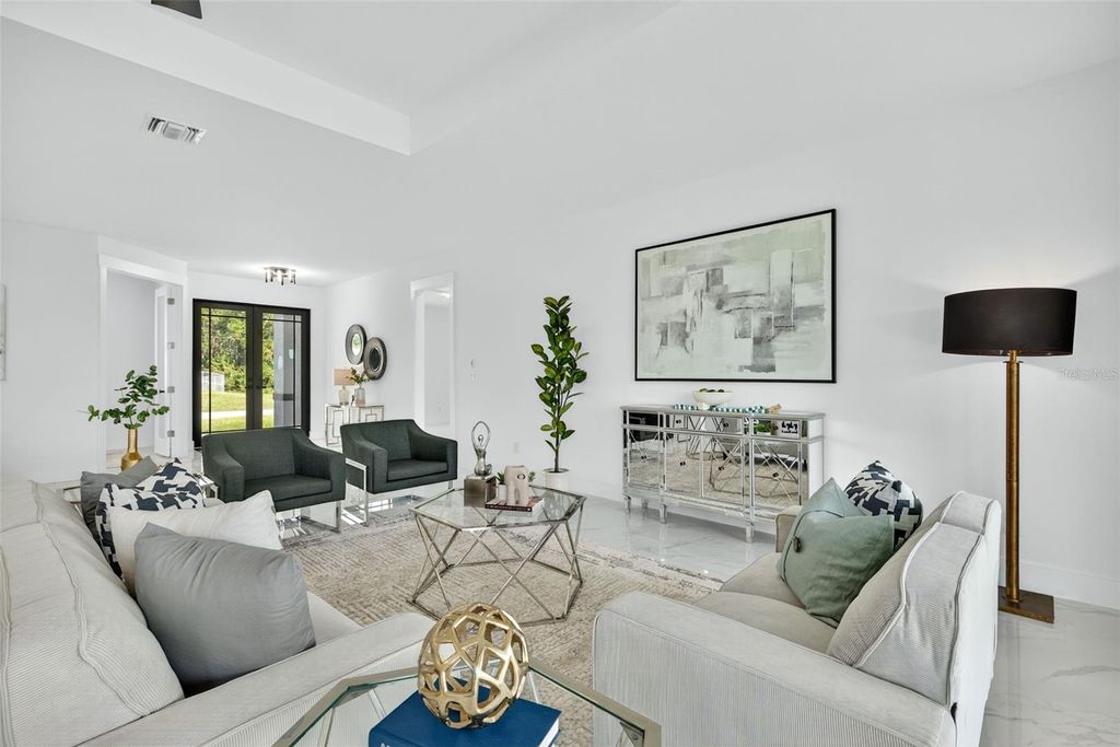 Photo of 3113 14th Street SW, Lehigh Acres, FL 33976 (MLS # C7522621)