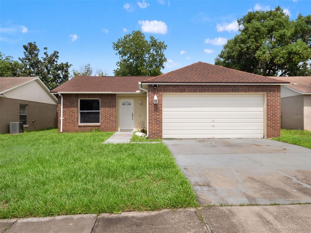 Photo of 8937 Valencia Gardens Drive, Orlando, FL 32825 (MLS # W7889493)