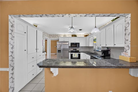 Tiny photo for 537 SE 19th Street, Ocala, FL 34471 (MLS # OM734644)