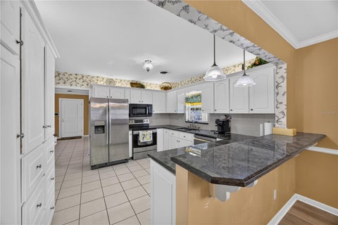 Tiny photo for 537 SE 19th Street, Ocala, FL 34471 (MLS # OM734644)