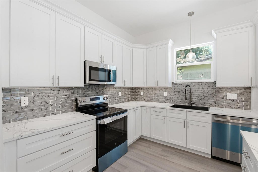 Photo of 1320 10th Avenue S, St Petersburg, FL 33705 (MLS # TB8549817)