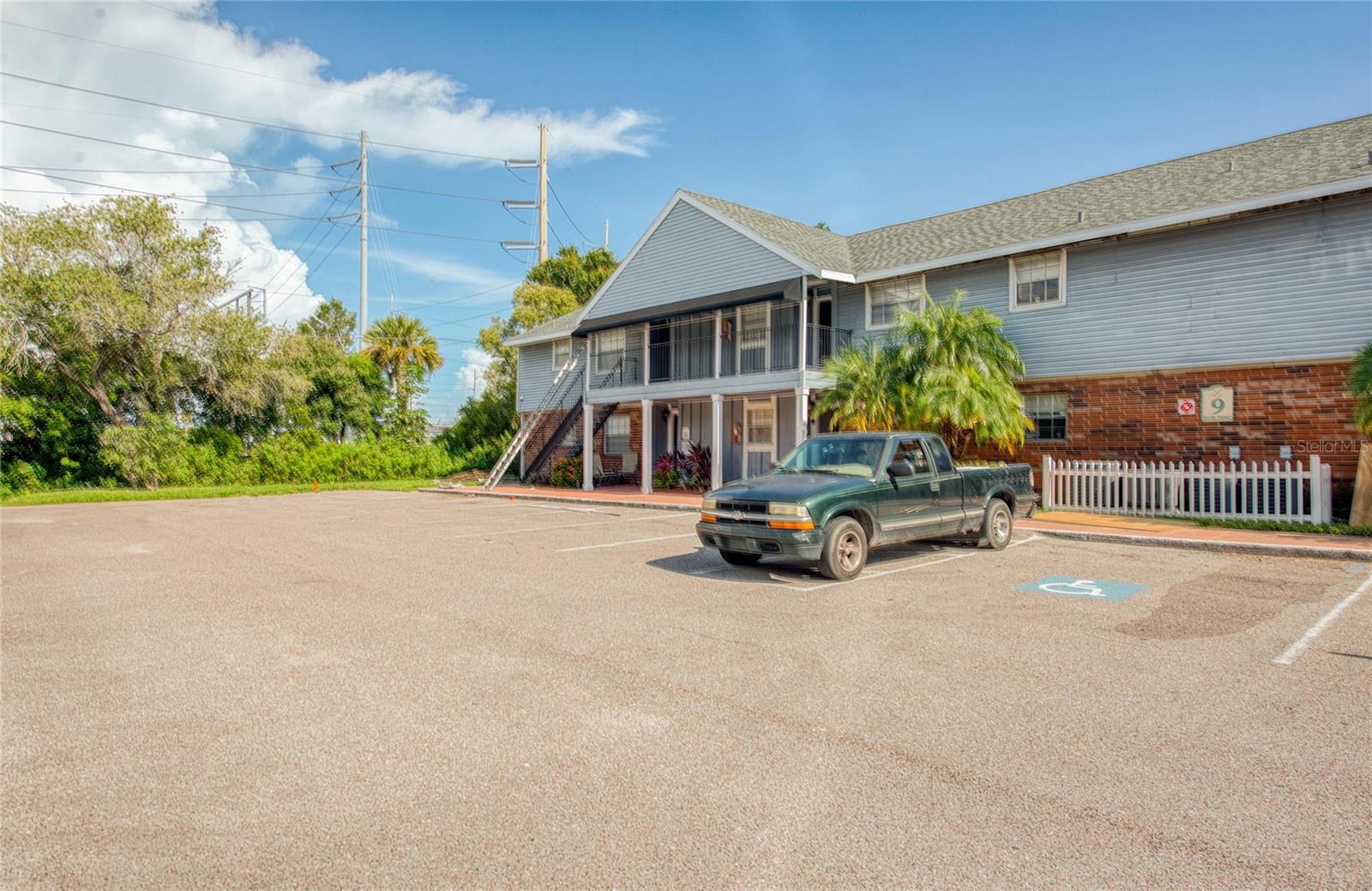 A blank canvas waiting for your vision to transform it into your dream home. Only 15 minutes from the beaches this 2 bed condo's master bedroom has a private bath and a walk in closet. Great location close to the beaches, dinning shopping and entertainment. The property was flooded during the hurricane and is sold as is. The condo fee includes internet, cable TV, all exterior and grounds maintenance, building insurance, trash, exterior repairs and pool maintenance.