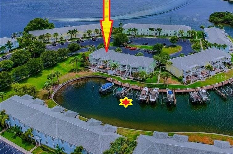 Looking for the perfect spot to park your Boat, with NO bridges and direct access to Tampa Bay? Well I have it, come be a part of this Resort Style Waterfront gated Community and you can purchase one of the Largest boat docks in the community. This is a dock with a 16,000 lb lift 14ft beam and can hold a 32ft boat. Dock has electric and water plus a fish cleaning station. You can purchase with a 2/1 condo right beside it or it can be purchased seperately. Must be a owner in waterside South or North to purchase. One of the cheapest communities in St Petersburg to own a boat lift. Lets go fishing!!