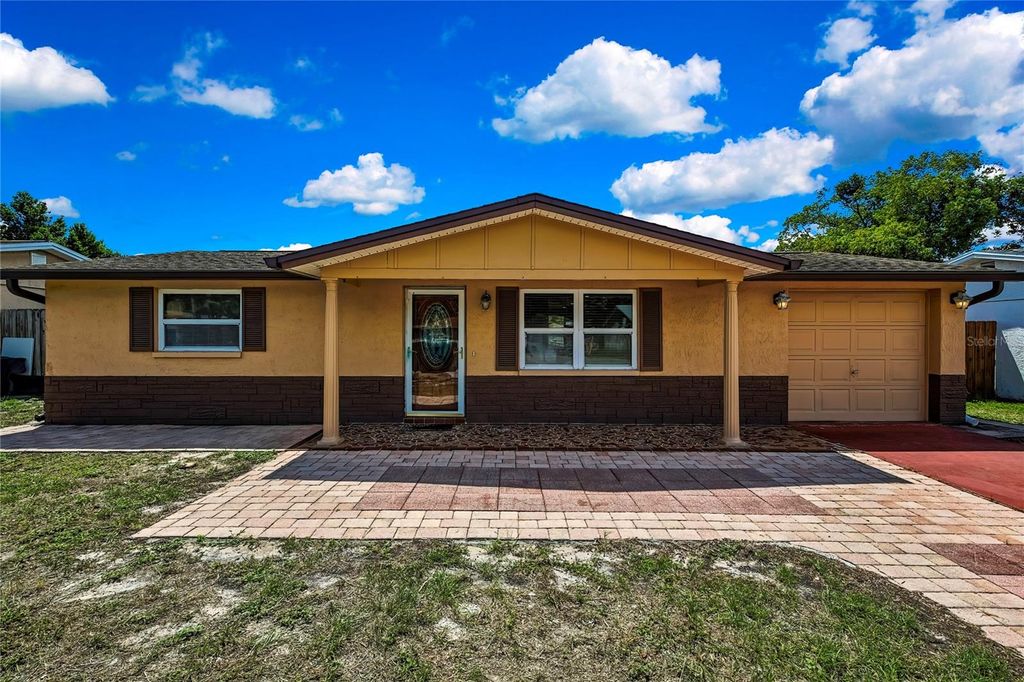 Photo of 7726 Gulf Highlands Drive, Port Richey, FL 34668 (MLS # OM708970)