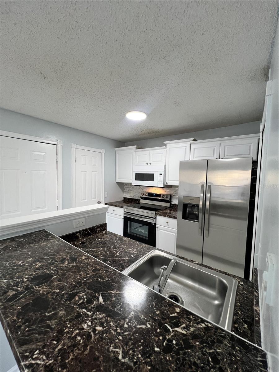 GRANDE OASIS AT CARROLLWOOD - Residential