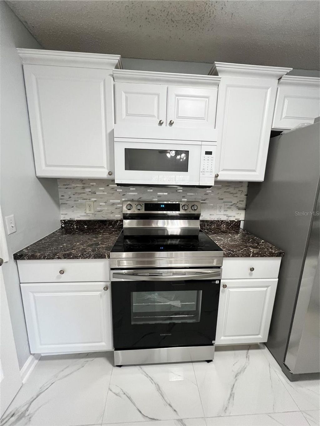 Photo of 3550 Tobago Lane #304, Tampa, FL 33614 (MLS # TB8475051)