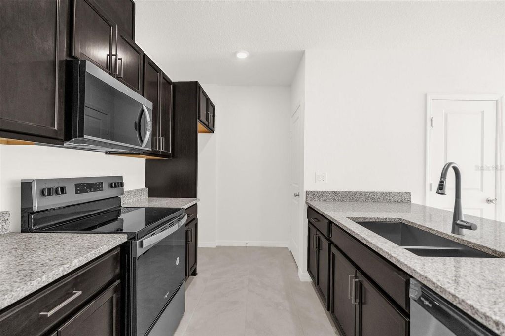 Photo of 399 Sequoia Drive, Lake Wales, FL 33859 (MLS # O6279067)