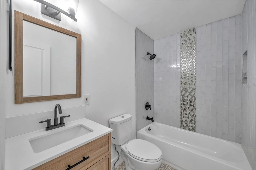 Photo of 304 W Idlewild Avenue, Tampa, FL 33604 (MLS # TB8466113)