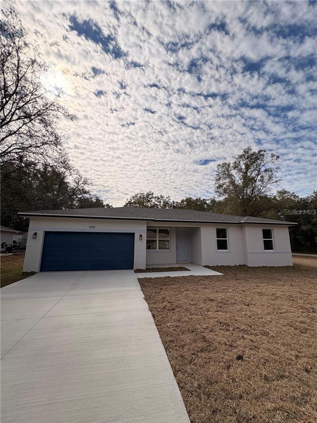 Photo of 2520 W Windchime Loop, Dunnellon, FL 34434 (MLS # O6388036)