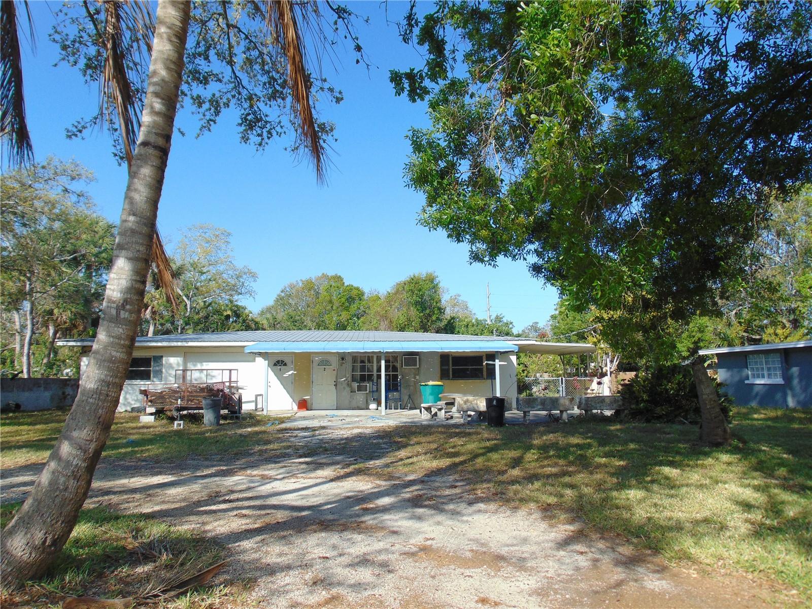 Investor alert. Could be finished as duplex or single family. Storm damaged. Needs to sell with 4385 as buildings encroach on lot lines.