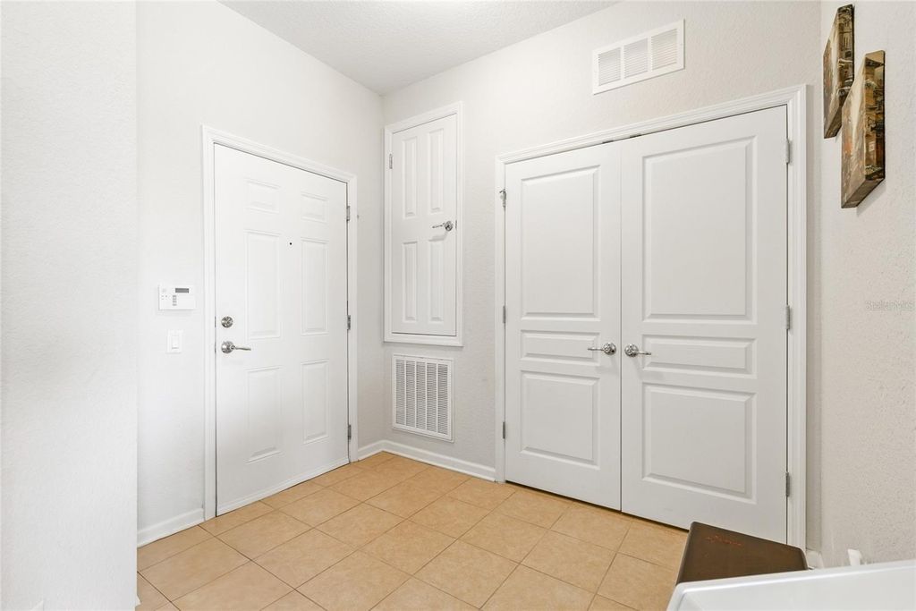 Photo of 8296 Portofino Drive #405, Davenport, FL 33896 (MLS # O6371031)