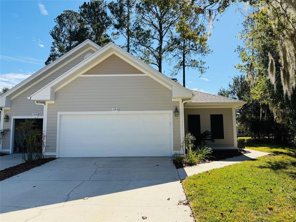 Photo of 12837 NW 12th Road, Newberry, FL 32669 (MLS # GC535162)