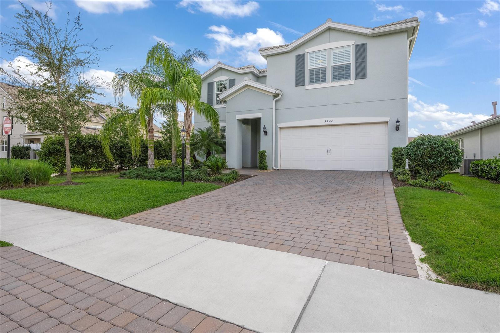 This meticulously upgraded Mallory Park residence offers luxury living in one of Lakewood Ranch's most desirable communities. Situated on a private lot, the home features a tranquil pool area and numerous custom enhancements throughout.
Upon entry, a bright foyer welcomes visitors to an open-concept main floor designed for entertaining. The spacious living area flows seamlessly into a gourmet kitchen, complete with a large island and comfortable dinette eating area. Two sliding patio doors connect to the outdoor retreat—a beautifully landscaped, heated pool and spa area perfect for both relaxation and social gatherings.
The first-floor primary suite features an elegant ensuite bathroom with walk-in shower and custom closet system. A versatile flex room near the entrance provides space for an office, den, or additional bedroom. Custom upgrades include unique built-in laundry room cabinetry, an ingenious office space under the staircase and tile flooring throughout the first floor.
The upper level offers three generously sized bedrooms, including one with an ensuite bathroom, plus a large open loft with wood flooring creating ample space for family or guests.
Mallory Park delivers a resort-style living experience with amenities including a community pool, clubhouse, pickleball and basketball courts, playground, and scenic walking trails. The established neighborhood environment eliminates construction noise while maintaining the prime Lakewood Ranch location, presenting a rare opportunity to enjoy premium Florida living.