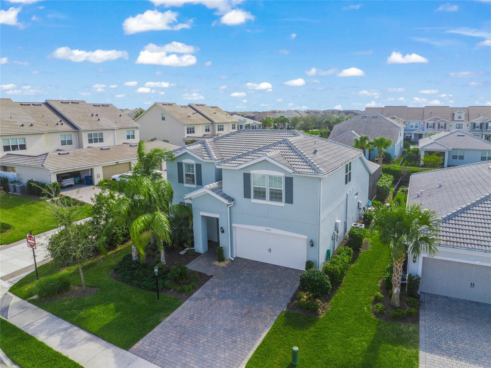 **Discover Luxury Living in Mallory Park!** Welcome to your dream home nestled within the highly sought-after community of Lakewood Ranch—where modern elegance meets tranquil living. This meticulously upgraded residence in Mallory Park is designed for those who appreciate sophistication and comfort. Set on a private lot, this stunning property boasts a serene pool area and an array of custom enhancements that elevate everyday living. As you step through the bright foyer, you are greeted by an expansive open-concept main floor that seamlessly blends style with functionality—perfect for entertaining family and friends. The spacious living area flows effortlessly into a gourmet kitchen, featuring a large island that invites culinary creativity and a cozy dinette eating space ideal for casual meals. Two sliding patio doors lead you to your outdoor oasis—a beautifully landscaped heated pool and spa area that serves as both a peaceful retreat and an entertainer’s paradise. Retreat to the first-floor primary suite, where luxury abounds with an elegant ensuite bathroom complete with a walk-in shower and a custom closet system designed for ultimate organization. A versatile flex room near the entrance offers endless possibilities—whether you envision it as an office, den, or additional bedroom, this space adapts to your lifestyle needs. Every detail has been thoughtfully considered in this home; from unique built-in cabinetry in the laundry room to an ingenious office nook tucked under the staircase, functionality meets style at every turn. The first floor is adorned with chic tile flooring that enhances its modern aesthetic. Venture upstairs to discover three generously sized bedrooms—including one with its own ensuite bathroom—and a spacious open loft adorned with warm wood flooring, providing ample room for family gatherings or guest accommodations. Mallory Park offers more than just exquisite homes; it delivers a resort-style living experience complete with amenities such as a community pool, clubhouse, pickleball and basketball courts, playgrounds, and scenic walking trails—all set within an established neighborhood that ensures peace away from construction noise while maintaining proximity to Lakewood Ranch's vibrant lifestyle. Don’t miss out on this rare opportunity to embrace premium Florida living! Schedule your private tour today and experience firsthand what makes this Mallory Park residence truly exceptional.