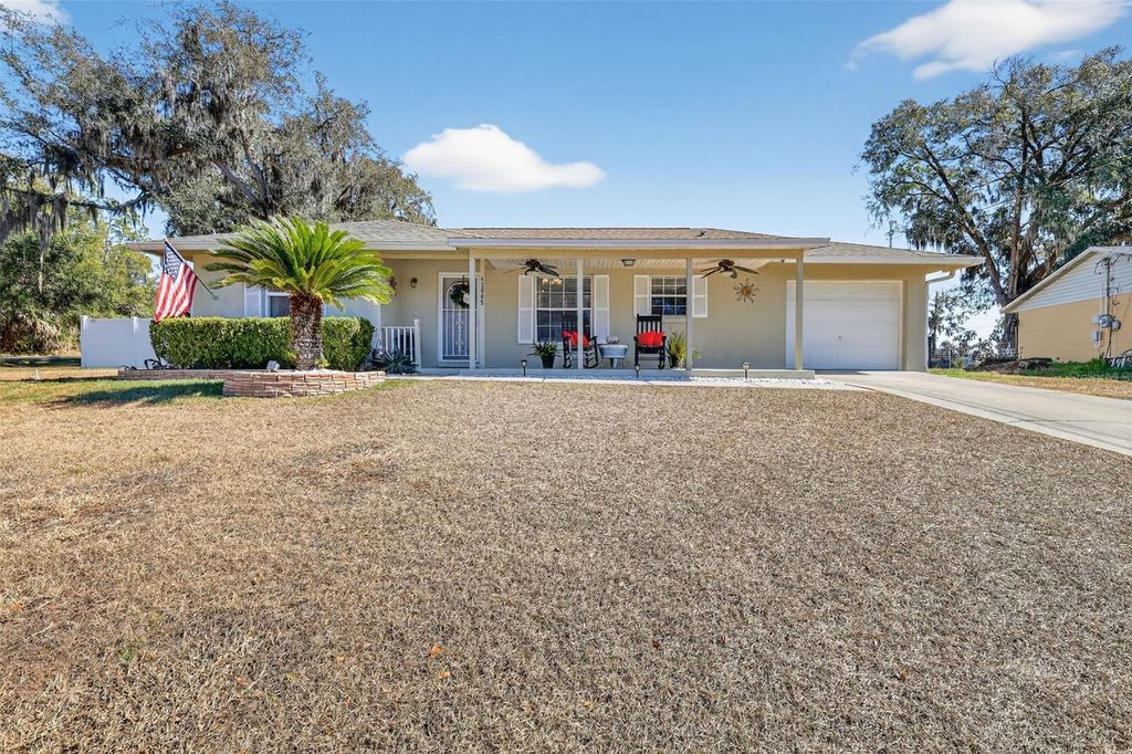 Photo of 12905 SE 117th Ct, Ocklawaha, FL 32179 (MLS # OM718102)