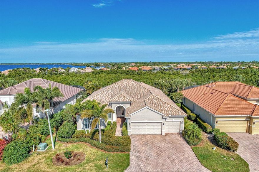ACT FAST! THIS IS THE DEAL YOU'VE BEEN WAITING FOR! MOTIVATED SELLER HAS MADE A HUGE $100,000.00 PRICE REDUCTION. NOW THE BEST-PRICED ESTATE POOL HOME WITH 3- PLUS CAR GARAGE IN RIVERWOOD CAN BE YOURS- ONLY $249 PER SQUARE FOOT! DON’T MISS THIS INCREDIBLE OPPORTUNITY to own one of the LARGEST and MOST SPECTACULAR CANTERBURY ESTATE HOMES in RIVERWOOD at an UNBEATABLE VALUE! STEP THROUGH THE GRAND PORTICO and prepare to be WOWED by the ARCHITECTURAL MARVELS of this IMMACULATE 5 BEDROOM, 4 BATHROOM ESTATE in the HIGHLY SOUGHT-AFTER RIVERWOOD COMMUNITY! This stunning home is designed for those who LOVE TO ENTERTAIN and enjoy an ACTIVE LIFESTYLE. Or for those LOOKING FOR A HOME TO ACCOMMODATE A MULTI-GENERATIONAL FAMILY. EVERY DETAIL IS PERFECTION—from soaring ceilings and ornate crown molding to designer lighting and custom window treatments. THE HEART OF THIS HOME: A CHEF’S DREAM KITCHEN! Exquisite cherry cabinets, gleaming granite countertops, high-end appliances, and an expansive center island - Perfect for cooking, entertaining, and making memories! OPULENT PRIMARY SUITE-A TRUE PRIVATE RETREAT! Grand double-door entry, Luxurious porcelain tile floors, Expansive walk-in closets, Spa-like master bath w/ rejuvenating Roman shower BONUS ROOM—FLEX SPACE for an executive office, hobby room, or extra bedroom! OUTDOOR OASIS—YOUR PRIVATE TROPICAL GETAWAY! SECLUDED PAVER LANAI w/ a mesmerizing CUSTOM-BUILT SALTWATER POOL & FOUNTAIN featuring stunning evening lighting for an enchanting ambiance & an extended patio—perfect for alfresco dining, gardening & relaxation! SPACIOUS 3-CAR EXTENDED GARAGE + UPGRADED MOTORIZED & ACCORDION SHUTTERS for ultimate convenience & peace of mind! RIVERWOOD: A RESORT-STYLE LIFESTYLE LIKE NO OTHER! #1 FLORIDA GOLF COURSE – GOLFER’S CHOICE 2021! Private Riverwood Beach Club on Manasota Key (based on membership availability) Activity Center w/ lap & resort-style pools, fitness center, pickleball, bocce, tennis courts, dog park, lawn croquet, library, art classroom, & endless social events! Close to Gulf Beaches, world-class fishing, Charlotte Harbor, Punta Gorda, Englewood, South Venice, Boca Grande & Spring Training facilities for the Tampa Bay Rays & Atlanta Braves! SCHEDULE YOUR SHOWING TODAY BEFORE IT’S GONE! ASK THE AGENT FOR DETAILS & MAKE THIS DREAM HOME YOURS!