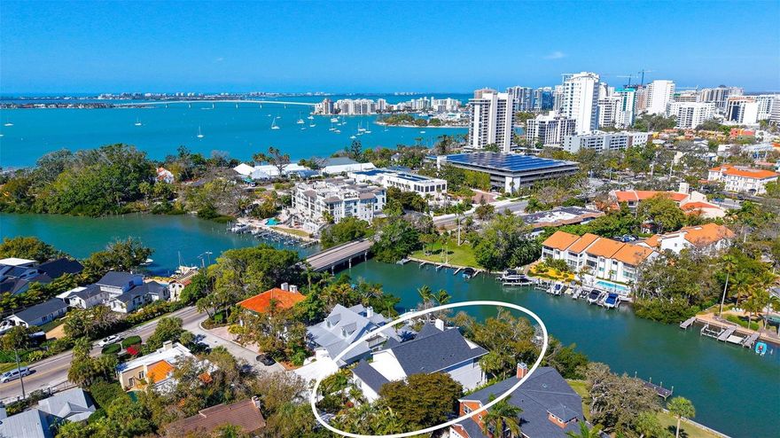 Welcome to a new (built in 2025) and extraordinary single-family waterfront home on the serene and beautiful Hudson Bayou - a premier, tranquil location that feels worlds away while reflecting the vibrancy of the city just moments away. This isn’t just a house, it’s your gateway to the very best of downtown living, and perhaps a viable in-town condominium alternative, with generous guest parking, low-maintenance landscape and NO ASSOCIATION DUES. Nestled in one of the city’s most coveted locations, this beautifully designed residence is just steps from the world-renowned Selby Botanical Gardens- where bayfront beauty, exotic orchids, and lush tropical landscapes await. You are also steps away from the vibrant heart of Downtown Sarasota, the serene Bayfront Park for sunset strolls and events and the city’s central marina. Inside you’ll be captivated by the thoughtful design and an ingenious use of space throughout. The main floor features a large and comfortable open floor plan of great room and kitchen, a luxurious primary suite, an en-suite guest bedroom plus an office. The main living area opens to a lovely private patio with plunge pool and spa overlooking garden and water views. Plus your own private boat dock, featuring a 13,000 lb boat lift and 67 feet of waterfront Upstairs 2 generous en-suite bedrooms await with luxuriously designed baths, each with access to an oversized second story terrace. In addition, this level features a large gym with sauna and a second office. Every inch of this home exudes quality and modern luxury: a show-stopping kitchen with top-tier appliances, a large central island perfect for gathering and entertaining, and a cleverly concealed walk-in pantry behind custom cabinet doors that keeps everything beautifully organized and out of sight. From the high-end finishes, to the seamless indoor-outdoor flow, this detail-filled home combines quality, elegance, and functionality with the unbeatable Sarasota lifestyle. It’s where nature, culture, and waterfront living converge right outside your door. Come experience yourself!