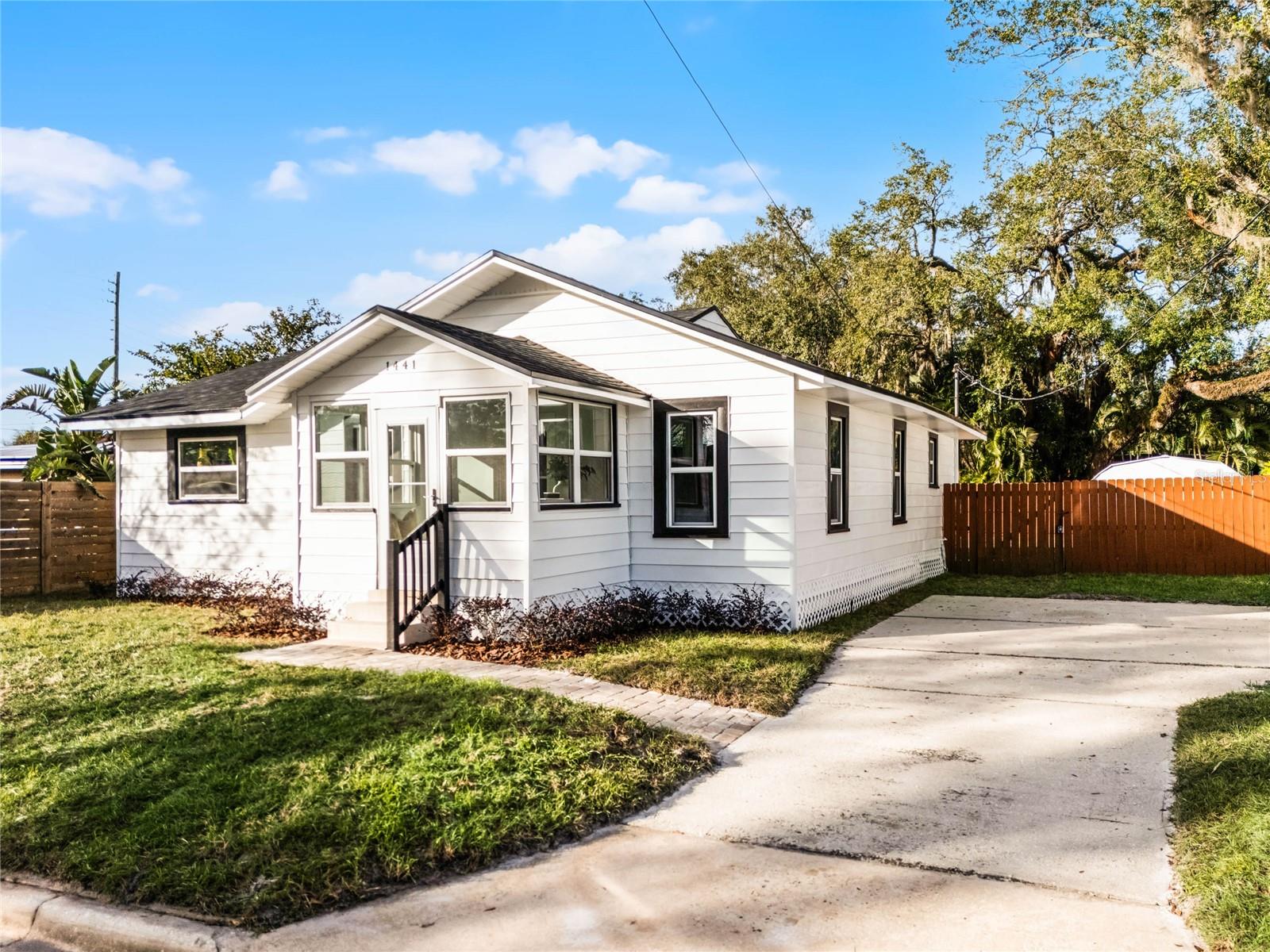 This beautifully RENOVATED single-family home is move-in ready! Featuring 3 spacious bedrooms and 2 modern bathrooms, the property offers a bright front enclosed SUNROOM perfect for relaxing or entertaining. The sleek, updated kitchen comes fully equipped with stainless steel appliances—including a refrigerator, stove, microwave, and dishwasher—and there's a convenient washer and dryer for added ease. Step outside to enjoy the brand-new deck overlooking a large, FENCED BACKYARD—ideal for outdoor activities and gatherings. Located in the desirable College Park neighborhood, you'll be just minutes from downtown Orlando, offering easy access to shopping, dining, and entertainment. Whether you're looking to RENT OR PURCHASE, this home is a fantastic opportunity. Schedule a viewing today and make this charming property your new home!