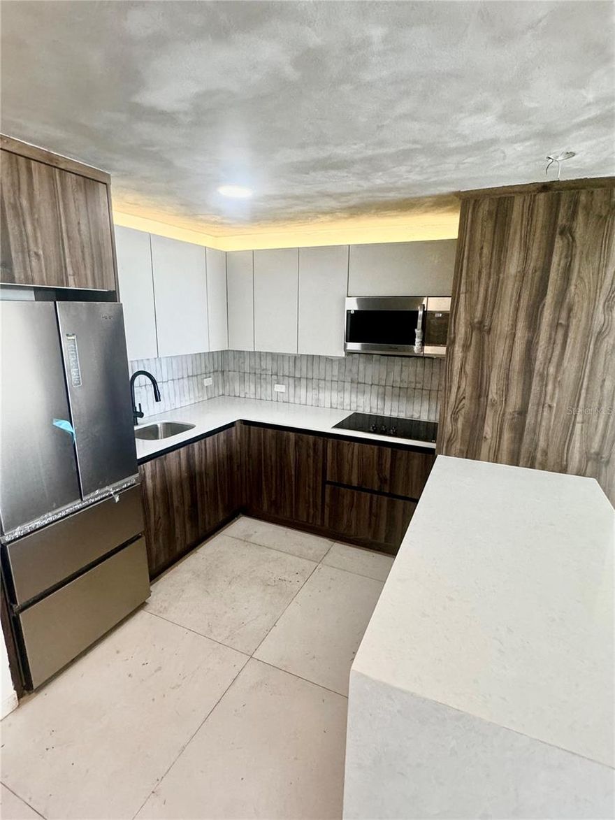 Exquisite two-bedrooms, two-bathrooms 10th floor residence, where luxury meets panoramic vistas in a recently remodeled haven. Nestled in the vibrant heart of Miramar. Recently remodeled, every detail of this home has been meticulously crafted for comfort and sophistication. Includes brand new washer, dryer, fridge, stovetop, one parking. Additional parking available for rent. Located mere moments away from the beach, restaurants, T-Mobile District. Positioned near schools, supermarkets, and parks. Available for rent now. Proof of income is required for showings. Schedule your viewing today!