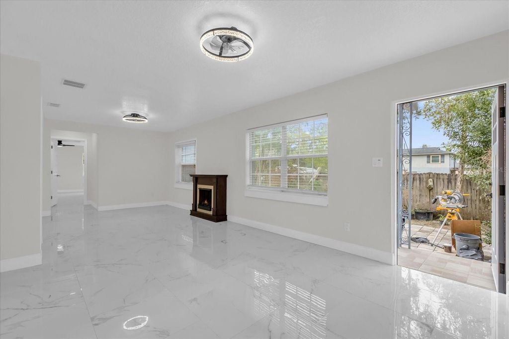 Photo of 7506 Mott Avenue, Orlando, FL 32810 (MLS # S5145873)