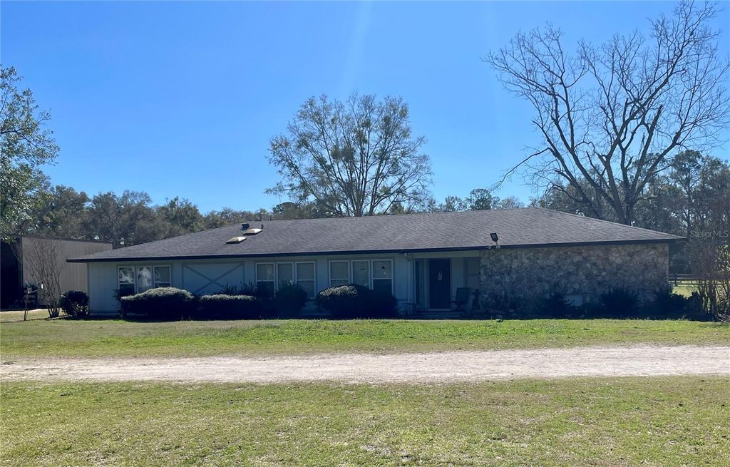 Photo of 16525 SW 5th Place, Newberry, FL 32669 (MLS # GC537481)