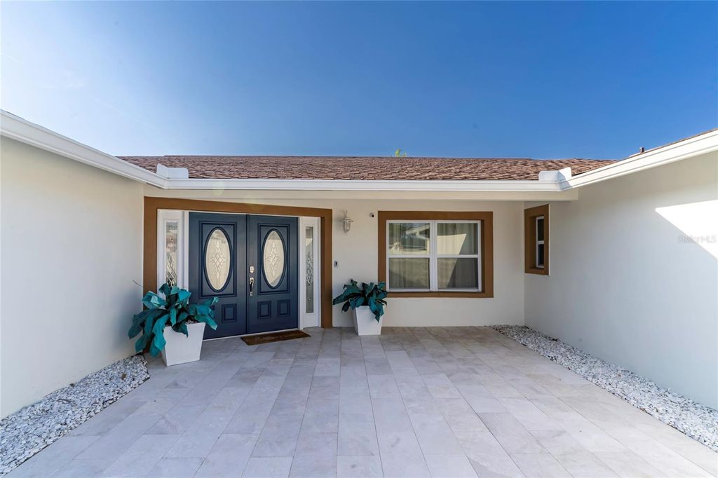 Photo of 320 Harbor Passage, Clearwater Beach, FL 33767 (MLS # TB8473675)