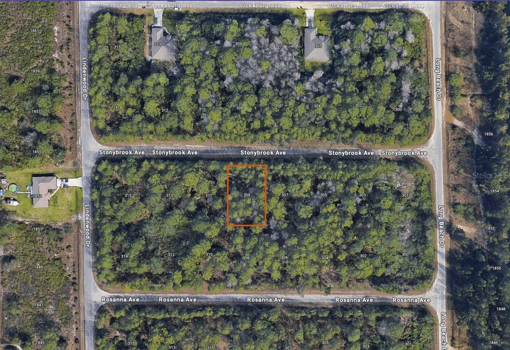 Photo of 309 Stonybrook Avenue, Lehigh Acres, FL 33972 (MLS # C7514341)