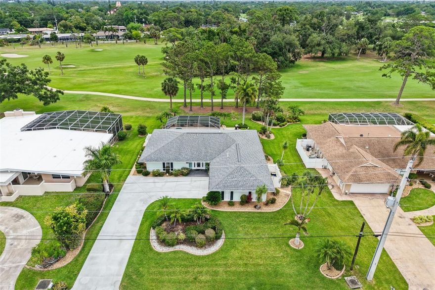 Experience the pinnacle of Florida’s mid-century charm in this impeccably maintained 3-bedroom, 2-bathroom residence with a side entry garage, perfectly situated on a premier golf course lot. Lowest price on the 7th tee!  This home has a private, resort-style oasis feel featuring a newly remodeled heated pool and spa, complete with modern Wi-Fi automation, outside security cameras & lighting, and a freshly re-screened cage—all framed by the lush, manicured fairways of the historic Sara Bay Country Club. Inside, the home shines with 2022 upgrades, including Luxury Vinyl Plank flooring and a comprehensive Trane HVAC system with new ductwork. Whether you are enjoying a morning coffee with panoramic golf course views or hosting an alfresco dinner under the mature palms, this property offers a rare move-in-ready lifestyle. For the golf enthusiast, an optional private membership to Sara Bay Country Club may provide access to the legendary Donald Ross-designed course and exclusive social amenities, allowing you to tailor your country club experience to your own pace.  There is no mandatory HOA, but there are some special rules that apply to the neighborhood in the Manatee County Development Code that apply specifically to Whitfield. There is a voluntary Neighborhood Association for an annual fee of $30.  The Sara Bay Country Club currently grants neighborhood association members a free culinary membership to the club, which grants limited dining privileges at the clubhouse.  Schedule your showing today!