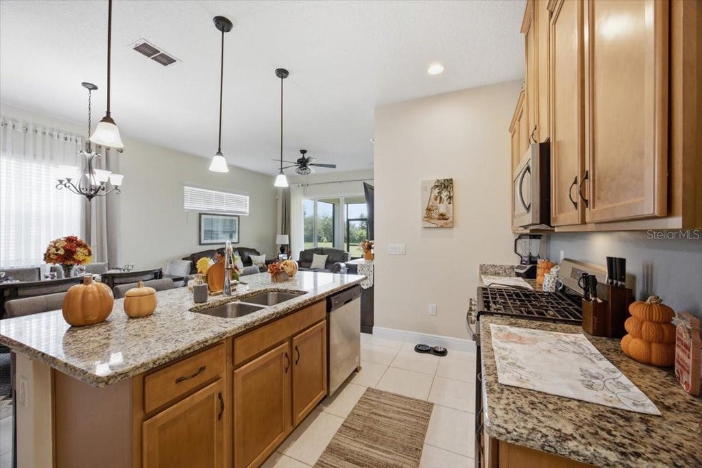 Photo of 2541 Yellow Brick Road, Saint Cloud, FL 34771 (MLS # O6437442)