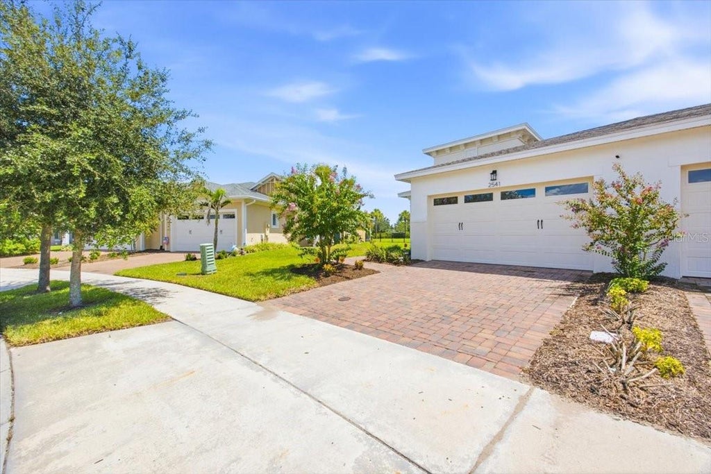 Photo of 2541 Yellow Brick Road, Saint Cloud, FL 34771 (MLS # O6437442)