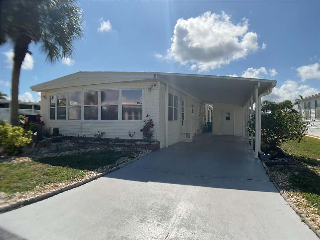 Photo of 2100 Kings Highway #98, Port Charlotte, FL 33980 (MLS # C7526535)
