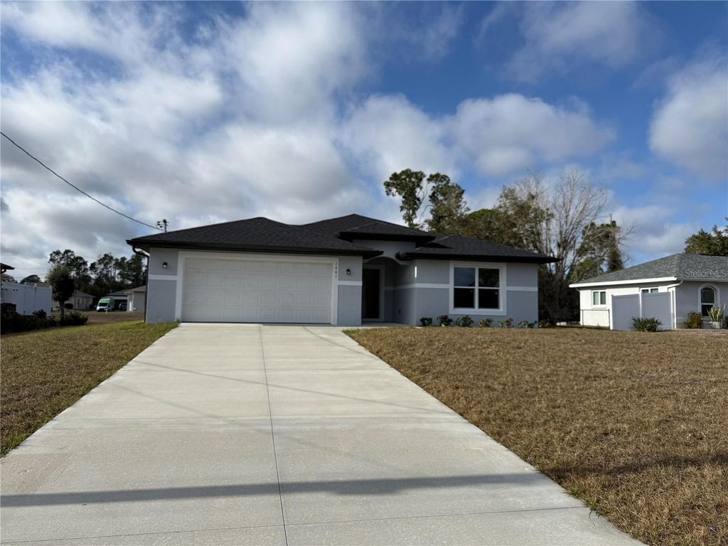 Photo of 1401 Urmey Lane, North Port, FL 34286 (MLS # A4682944)