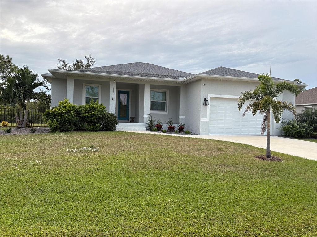 Photo of 14377 Overlook Avenue, Port Charlotte, FL 33981 (MLS # C7517802)