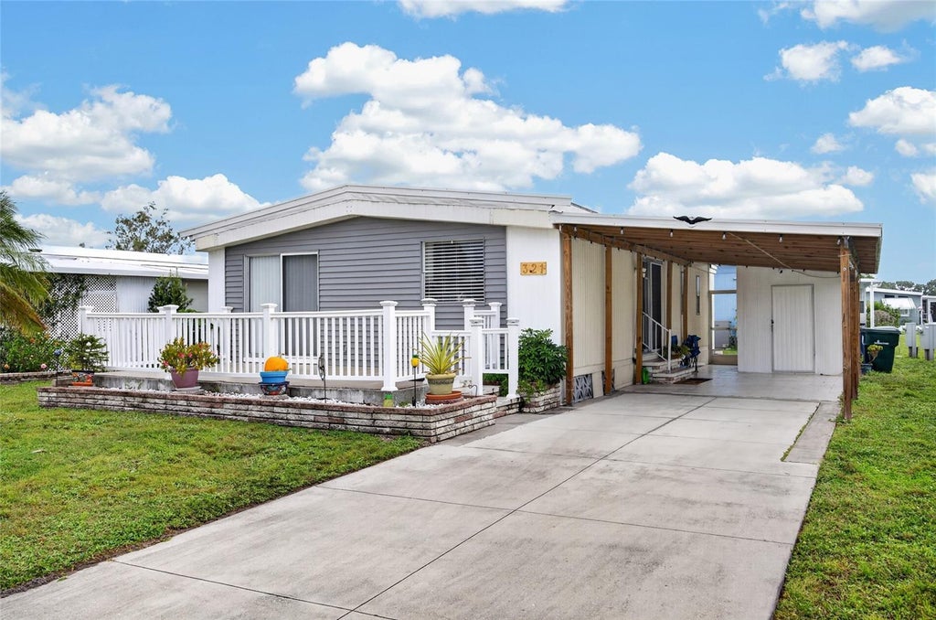 Photo of 321 La Costa, North Port, FL 34287 (MLS # C7532630)