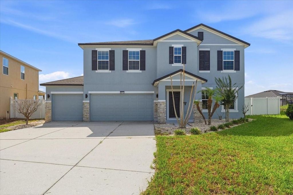 Photo of 9012 Orange Blossom Loop, Haines City, FL 33844 (MLS # O6409462)