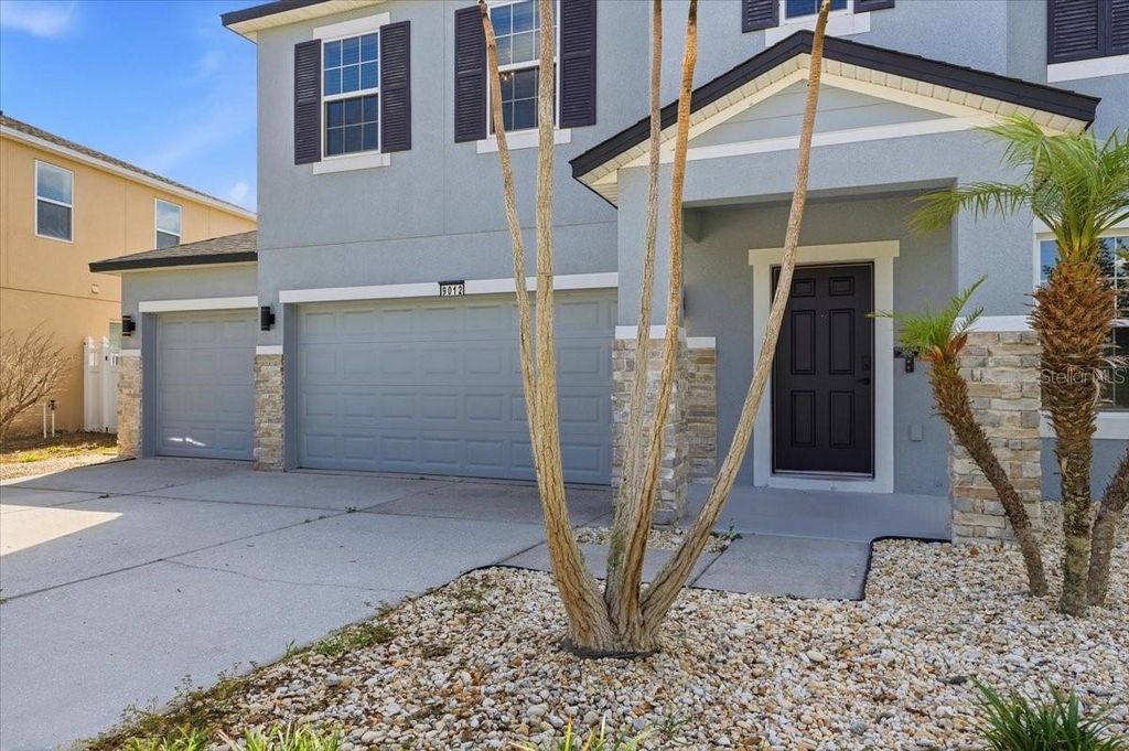Photo of 9012 Orange Blossom Loop, Haines City, FL 33844 (MLS # O6409462)