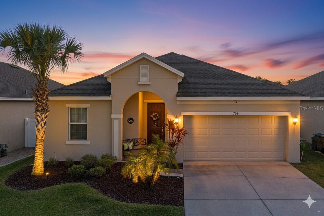 Absolutely stunning 3-bedroom, 2-bathroom home with incredible indoor-outdoor living anchored by one of the best patio spaces you’ll find. This single-story residence has been beautifully maintained and offers a layout designed for both comfort and entertaining. From the moment you arrive, the curb appeal sets the tone with a welcoming front entry and fresh landscaping that complements the home’s inviting style. Step inside to discover an open-concept living area finished with laminate flooring throughout, creating a seamless flow from room to room. The spacious living room provides multiple seating options and a direct connection to the dining area, making it easy to host gatherings or enjoy quiet evenings at home. The kitchen is both stylish and functional, featuring rich dark cabinetry, gleaming granite countertops, black appliances, and a convenient breakfast bar for casual dining. The adjacent dining area easily accommodates a large table and enjoys views of both the living room and patio, keeping everything connected. The primary suite is a private retreat, complete with a generous bedroom, a huge walk-in closet, and a well-appointed bathroom with dual vanities, a spacious shower, and a private toilet room. Two additional bedrooms and a full bathroom provide flexibility for guests, hobbies, or work-from-home needs. The laundry room is equipped with built-in cabinetry, making everyday organization a breeze. What truly sets this home apart is the expansive screened patio — a versatile outdoor living area designed for Florida living at its best. The screened enclosure keeps it comfortable year-round, while the fully fenced backyard provides privacy and security. The patio easily accommodates multiple setups: outdoor dining, barbecues, a lounge set, and even a dedicated TV wall for game days or movie nights. This space feels like a natural extension of the living room and is a highlight for everyday living. Beyond the home itself, the community provides a sparkling pool and playground, adding even more convenience and recreation just steps away. The location is another major advantage. Just 10 minutes from Saint Cloud Lakefront Park and 25 minutes from Orlando International Airport, you’ll also be within 30 minutes of Lake Nona’s Medical City. Downtown Orlando, Walt Disney World Parks, and Universal Studios Parks are all about a 35-minute drive, while Florida’s beautiful east coast beaches can be reached in roughly 90 minutes. This home blends low-maintenance living with standout spaces both indoors and out, offering an opportunity you won’t want to miss.