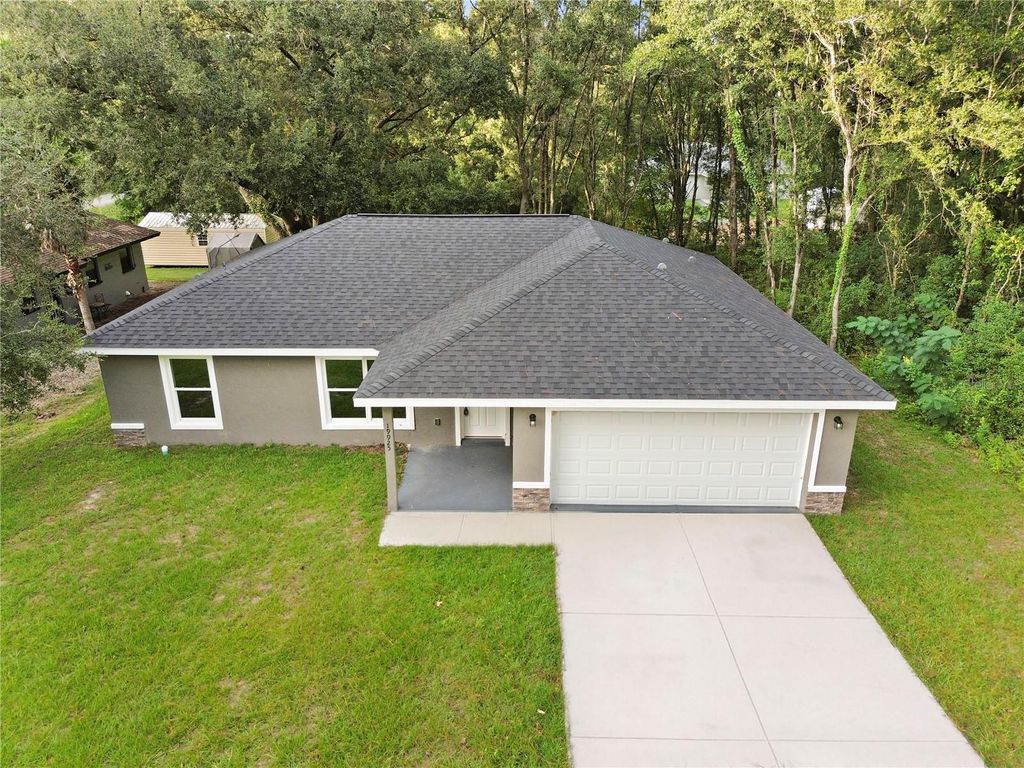 Photo of 19925 SW Lark Drive, Dunnellon, FL 34431 (MLS # OM711159)