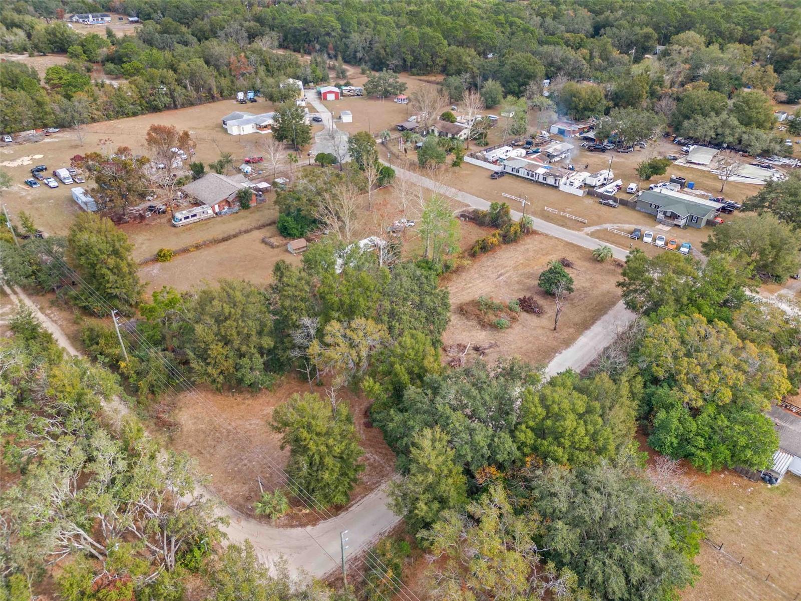 Discover the perfect setting for your dream property on this 1.03-acre vacant lot in the peaceful community of Spring Hill, FL. Whether you're planning to build a custom home, create a quiet retreat, or start a small hobby farm, the AR (Agricultural-Residential) zoning provides the flexibility to make it happen. This zoning allows for cultivating crops, raising small livestock, or simply enjoying a serene, rural lifestyle.
The property is development-ready with septic and electricity already in place—saving you valuable time and making it easier to get started right away. With over an acre of land, there's plenty of room for gardens, outdoor recreation, or even a barn or workshop to complement your future home.
Set in a tranquil area surrounded by natural beauty, this location blends privacy with convenience. Recreational spots like Weeki Wachee Springs State Park are easily accessible for outdoor adventures, and major highways connect you to nearby cities such as Tampa and Orlando, as well as the Gulf Coast.
Spring Hill is known for its balance of suburban amenities and rural charm, with quality schools, local shops, and dining options close by. Whether you're looking to build your forever home or invest in a versatile piece of land, this property has the potential to meet your vision.
Come see the possibilities for yourself—schedule a visit today and take the first step toward bringing your plans to life on this beautiful 1.03-acre lot.